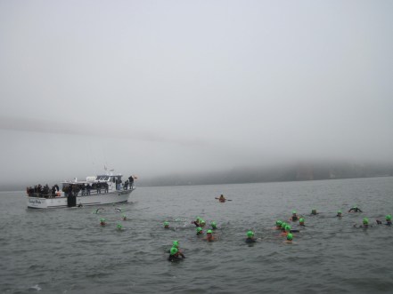 Exiting the boat and swimming to the start line.
